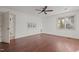 Hardwood floor bedroom with access to another room at 232 Lakeview Dr, Sanford, NC 27332