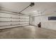 Garage with an automatic door and built-in shelving at 232 Lakeview Dr, Sanford, NC 27332
