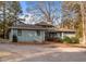 Ranch house with a large yard and brick walkway at 232 Lakeview Dr, Sanford, NC 27332