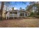 Back of house with deck and backyard at 232 Lakeview Dr, Sanford, NC 27332