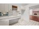 Modern kitchen with stainless steel appliances and blue tile backsplash at 232 Lakeview Dr, Sanford, NC 27332