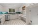 Modern kitchen with stainless steel appliances and blue tile backsplash at 232 Lakeview Dr, Sanford, NC 27332