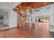 Living room with spiral staircase and hardwood floors at 232 Lakeview Dr, Sanford, NC 27332