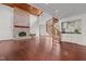 Living room with fireplace and spiral staircase at 232 Lakeview Dr, Sanford, NC 27332