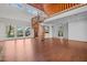 Open living area with spiral staircase and hardwood floors at 232 Lakeview Dr, Sanford, NC 27332
