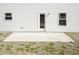 The backyard has a concrete patio with a door leading into the home at 237 Hopewell Branch Ct, Smithfield, NC 27577