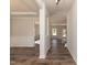 Inviting foyer featuring hardwood floors, neutral walls, and elegant trim work leading into other rooms at 237 Hopewell Branch Ct, Smithfield, NC 27577