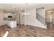 Open concept boasts a center island, granite countertops, and modern appliances at 237 Hopewell Branch Ct, Smithfield, NC 27577
