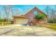 Brick garage with large door and spacious driveway at 2440 Helena Moriah Rd, Timberlake, NC 27583