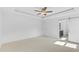 Spacious bedroom with ceiling fan and ensuite bathroom access at 250 Eason Creek Way, Clayton, NC 27527