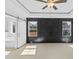 Bright bedroom featuring a statement wall and ensuite bath at 250 Eason Creek Way, Clayton, NC 27527