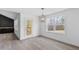 Bright dining room with large windows and chandelier at 250 Eason Creek Way, Clayton, NC 27527