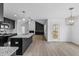 Open concept kitchen with an island and breakfast area at 250 Eason Creek Way, Clayton, NC 27527