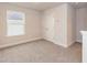 Upstairs bedroom with carpet flooring and closet at 251 Hopewell Br Ct, Smithfield, NC 27577