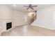Spacious living room with fireplace, hardwood floors, and staircase view at 251 Hopewell Br Ct, Smithfield, NC 27577