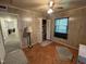 Bedroom with paneled walls and wood-look flooring at 2612 Academy St, Sanford, NC 27332