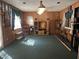 Bonus room with green carpet and wood paneled walls at 2612 Academy St, Sanford, NC 27332