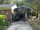 Covered carport area attached to home at 2612 Academy St, Sanford, NC 27332