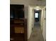 The hallway provides a view of the bedrooms with overhead lighting at 2612 Academy St, Sanford, NC 27332