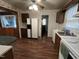 Kitchen featuring wood cabinets and vintage light fixture at 2612 Academy St, Sanford, NC 27332