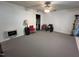 Spacious living room with neutral carpet and ceiling fan at 2612 Academy St, Sanford, NC 27332