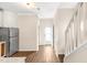 Bright entryway with hardwood floors, white trim, and natural light at 30 Cheltenham Dr, Clayton, NC 27520
