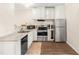 Charming kitchen with modern appliances, sleek countertops and ample cabinet space at 30 Cheltenham Dr, Clayton, NC 27520