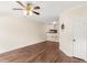Spacious living area with hardwood floors and bar stool seating to an open kitchen at 30 Cheltenham Dr, Clayton, NC 27520