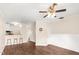 Bright and open floor plan flowing from the kitchen with bar seating into the living room at 30 Cheltenham Dr, Clayton, NC 27520