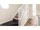 Stairway with decorative patterned stair runner and natural light from window at 30 Cheltenham Dr, Clayton, NC 27520