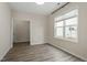 Spacious dining room with hardwood floors and access to a hallway at 36 Schoolhouse Way, Clayton, NC 27520