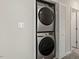 Stacked Samsung washer and dryer in a closet at 36 Schoolhouse Way, Clayton, NC 27520