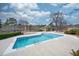 Inviting community pool with deck and surrounding landscaping at 3805 Chimney Ridge Pl # 008, Durham, NC 27713