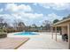 Relaxing community pool area with deck and grill at 3805 Chimney Ridge Pl # 008, Durham, NC 27713