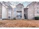 Rear view of building showing multiple units and landscaping at 3805 Chimney Ridge Pl # 008, Durham, NC 27713