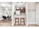 Modern kitchen with granite countertops and dark wood cabinets at 3805 Chimney Ridge Pl # 008, Durham, NC 27713
