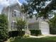 Charming two-story home featuring a well-maintained lawn, attached garage, and neutral siding at 3905 Song Sparrow Dr, Wake Forest, NC 27587