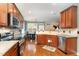 Well-equipped kitchen with stainless steel appliances, granite countertops, and hardwood flooring at 3905 Song Sparrow Dr, Wake Forest, NC 27587