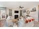 Cozy living room showcasing neutral tones, plush seating, a fireplace, and decorative accents at 3905 Song Sparrow Dr, Wake Forest, NC 27587