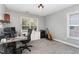 Well lit office space with neutral walls, plush carpet and plenty of space for productivity at 3905 Song Sparrow Dr, Wake Forest, NC 27587