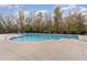 Community pool with many trees surrounding at 3905 Song Sparrow Dr, Wake Forest, NC 27587
