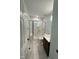 Bathroom with tile floors and a walk-in shower at 401 Commonwealth St St, Durham, NC 27703