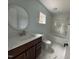 Bathroom with a bathtub, shower, and vanity at 401 Commonwealth St St, Durham, NC 27703