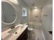 Bathroom with a bathtub, shower, and vanity at 401 Commonwealth St St, Durham, NC 27703