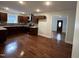 Modern kitchen with dark wood cabinets and quartz countertops at 401 Commonwealth St St, Durham, NC 27703
