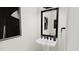 Stylish powder room with pedestal sink and modern fixtures at 4081 Elk Creek Ln # 07, Raleigh, NC 27612