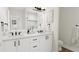 Shared bathroom with double vanity and white cabinets at 4081 Elk Creek Ln # 07, Raleigh, NC 27612