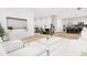 Open concept living and dining area with hardwood floors and ample natural light at 4081 Elk Creek Ln # 07, Raleigh, NC 27612
