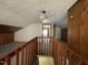 Bonus room with a view of other rooms and a wooden railing at 516 S Flanner St, Burlington, NC 27215