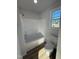 Simple bathroom with shower and bathtub at 52 Faucette Dr, Selma, NC 27576